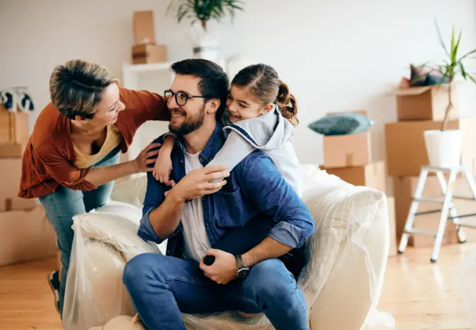 happy-family-talking-having-fun-while-relocating-into-new-home
